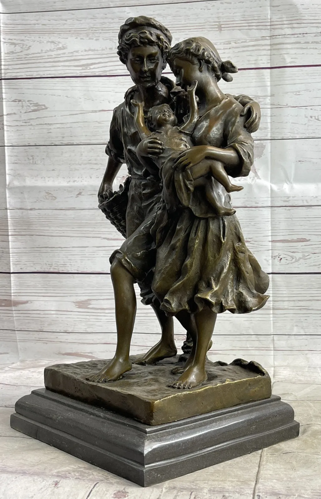 Handcrafted Vintage Man and woman Holding a Baby Real Bronze Sculpture statue