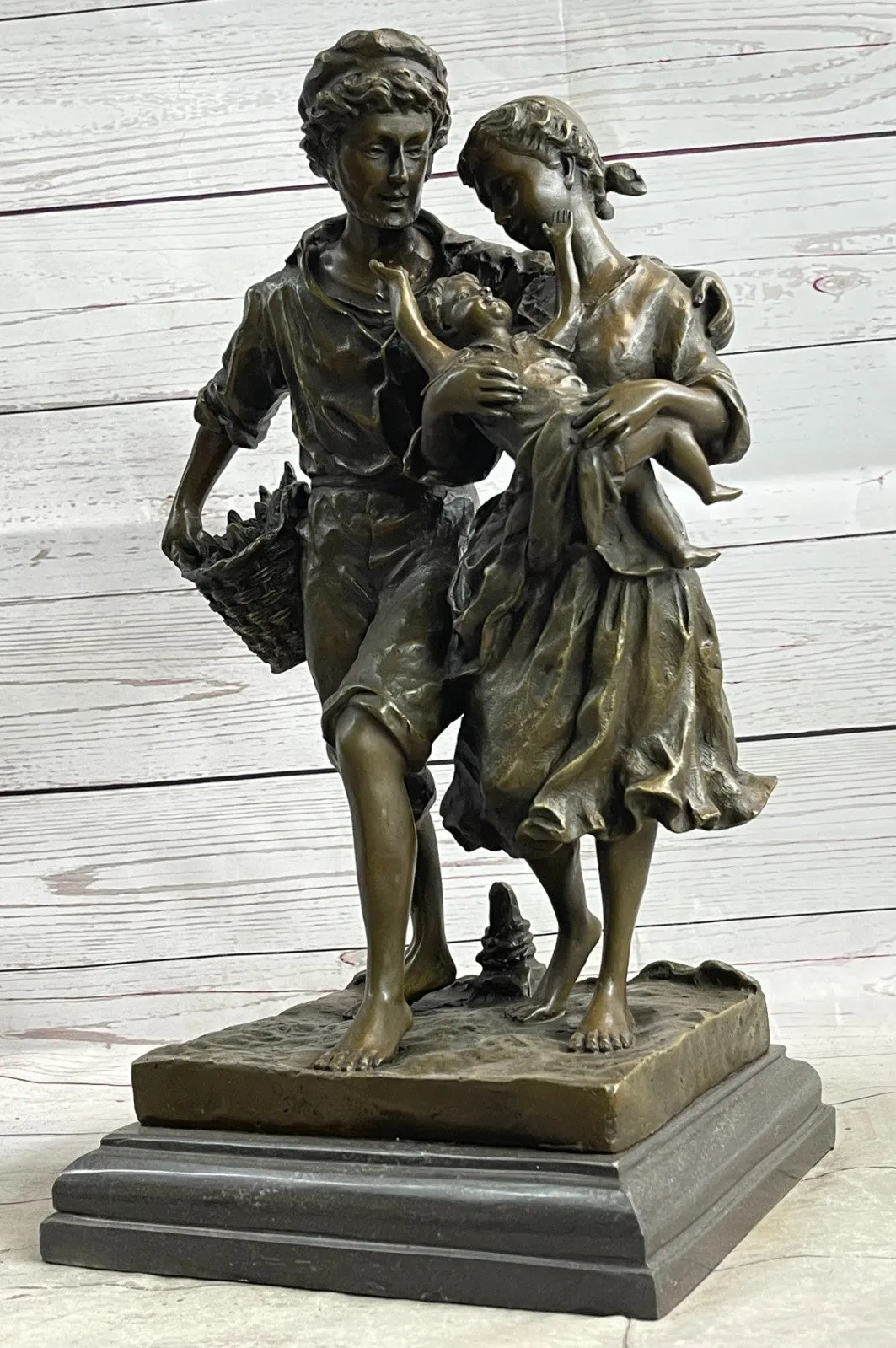 Handcrafted Vintage Man and woman Holding a Baby Real Bronze Sculpture statue