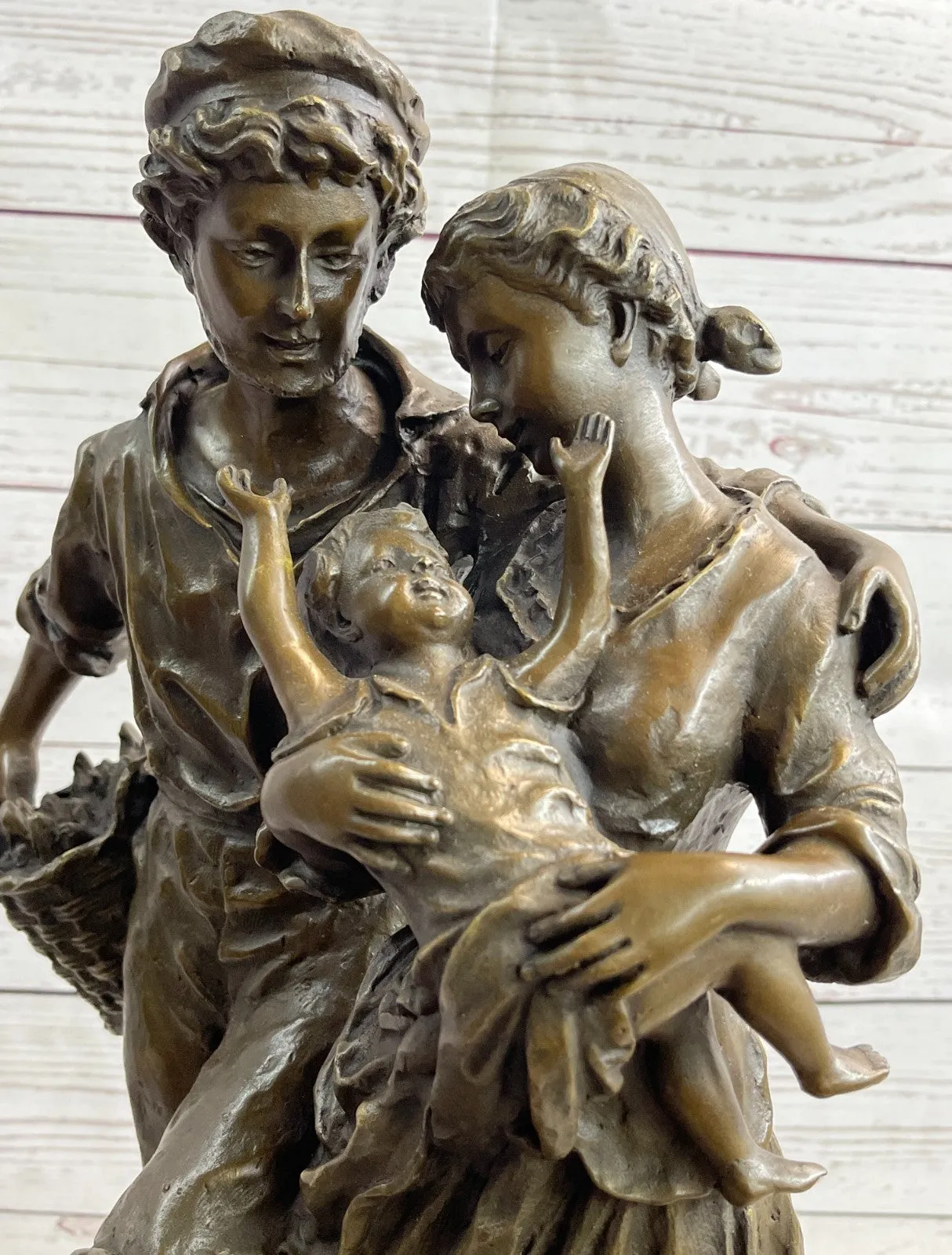 Handcrafted Vintage Man and woman Holding a Baby Real Bronze Sculpture statue