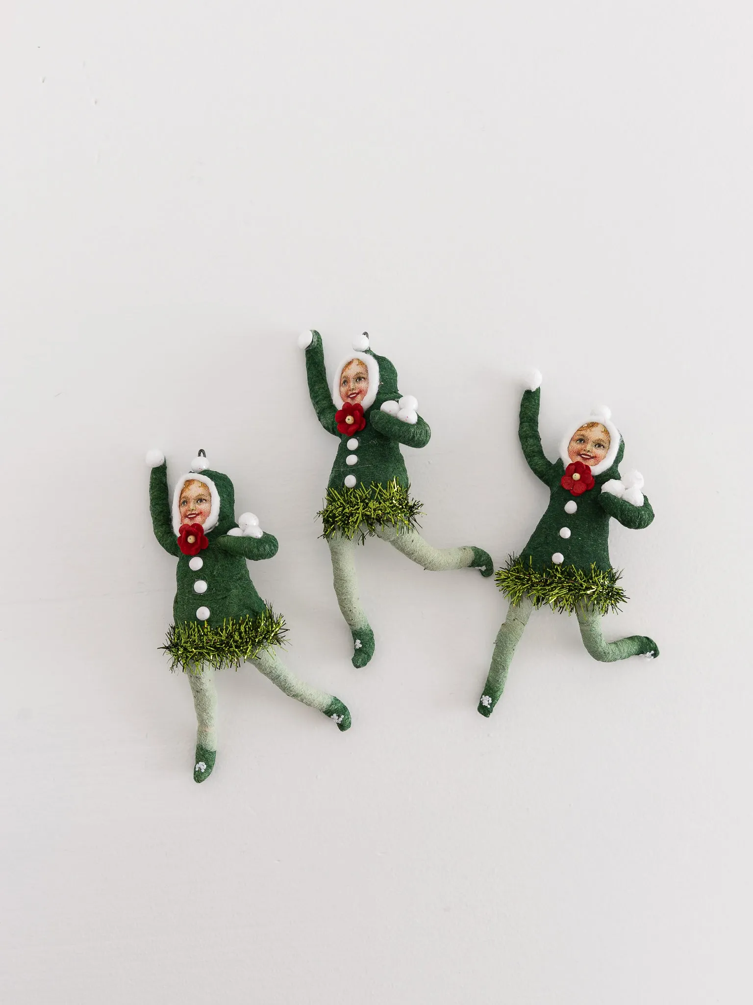 Snowball Thrower Ornament in Green